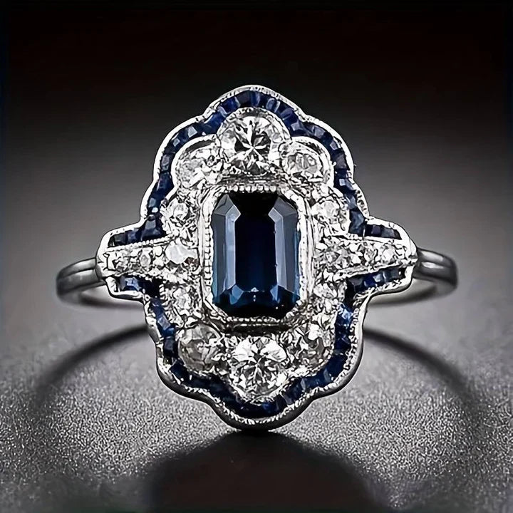 Anello vintage in argento e cristallo blu